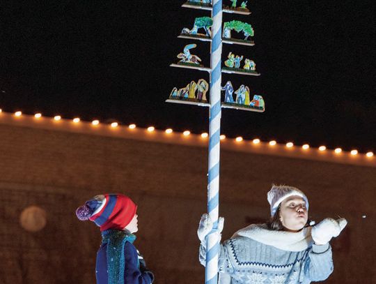 SANTA CLAUS COMES TO TOWN IN THE ANNUAL CHRISTMAS PARADE