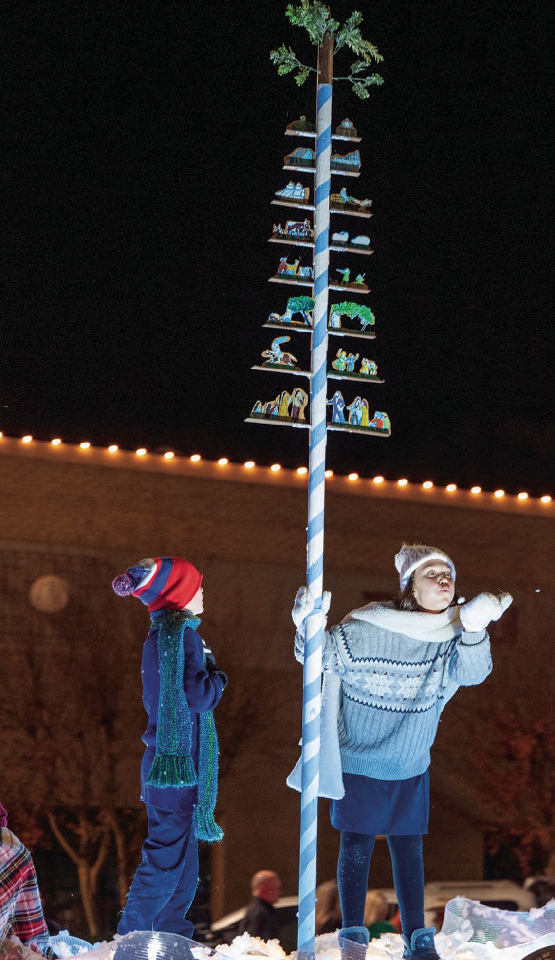 SANTA CLAUS COMES TO TOWN IN THE ANNUAL CHRISTMAS PARADE